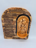 The Lords Prayer Plaque with The Holy Family and a Water Font