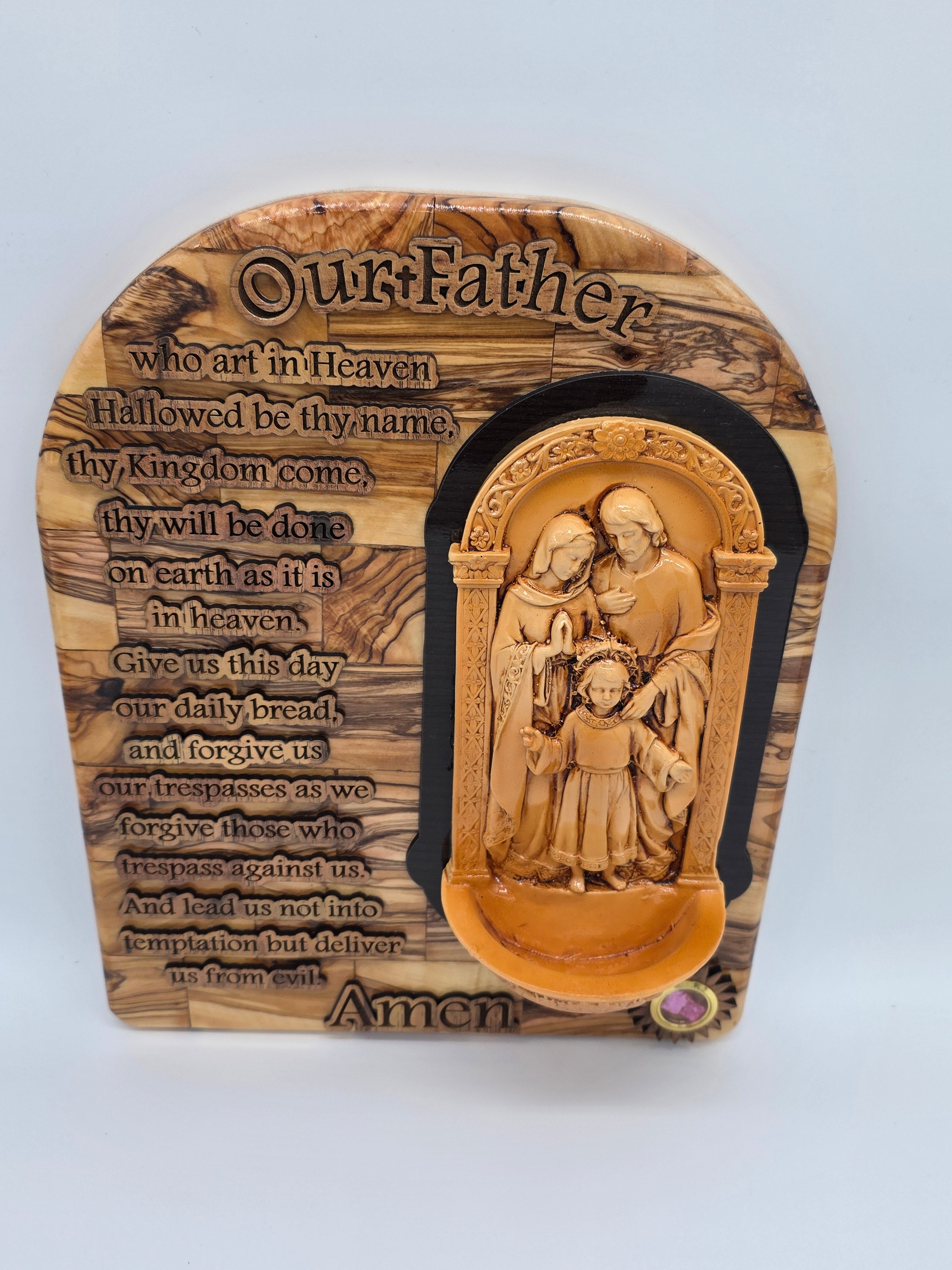 The Lords Prayer Plaque with The Holy Family and a Water Font